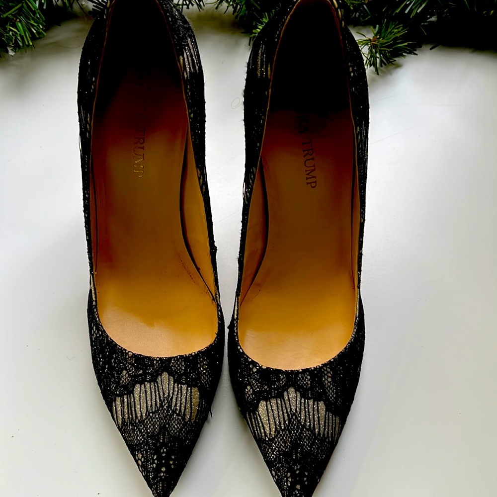 Black and silver laced heel. Size 9